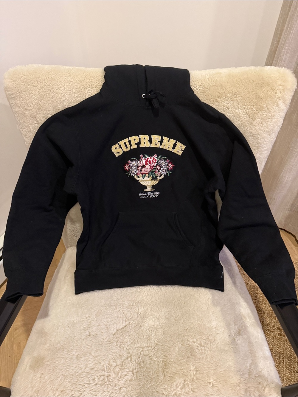 Supreme Black Hoodie with Cream Logo and Multicolor Floral Print
